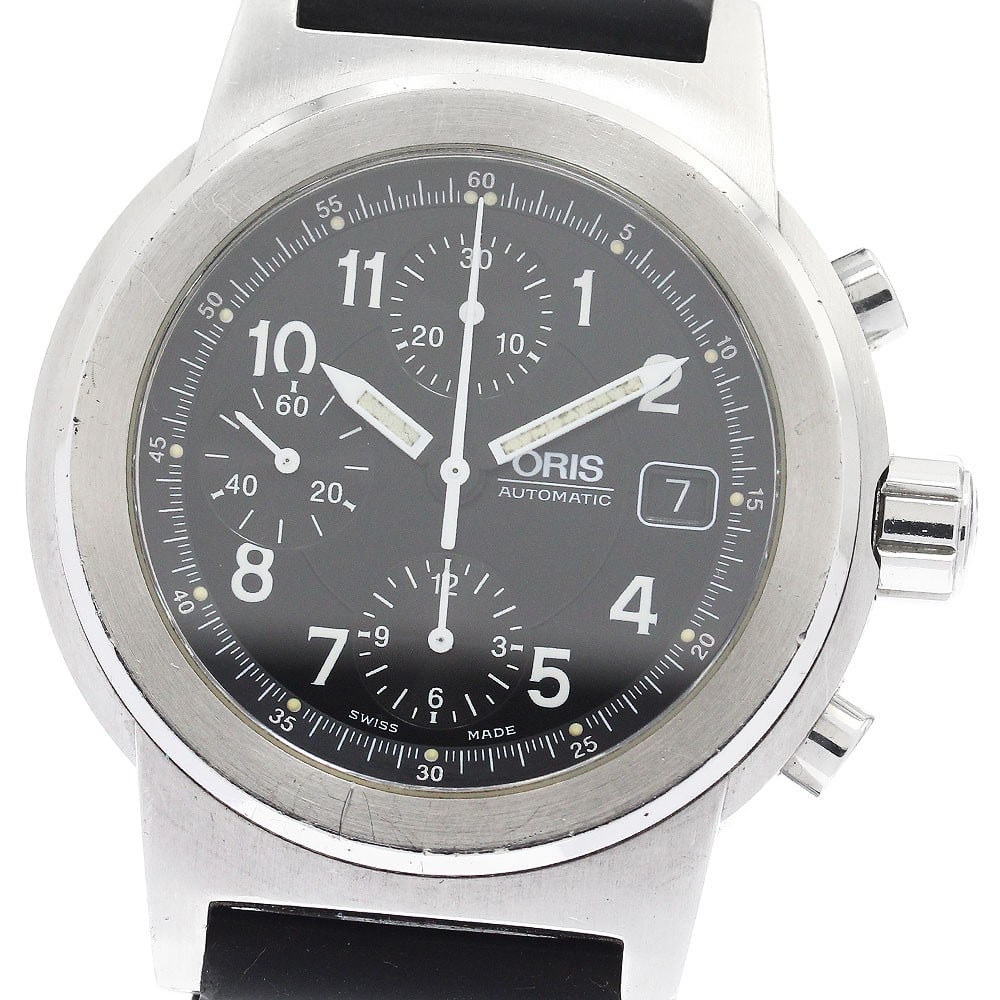 ORIS Big Crown 7511 Automatic Chronograph Date Watch: ORIS Big Crown 7511 Automatic Chronograph Date Watch This pre-owned ORIS Big Crown Date Chronograph men's wristwatch features a stainless steel case and a black dial with automatic movement. The watch
