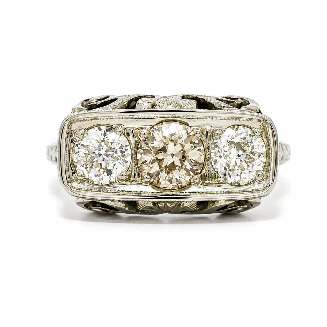 Art Deco 18k White Gold Ring with 3 Old European Cut Diamonds 1.26ct: Art Deco 18k White Gold Ring with 3 Old European Cut Diamonds 1.26ct An antique Art Deco cocktail ring crafted in solid 18k white gold with engraved work. It features three natural genuine old Europea