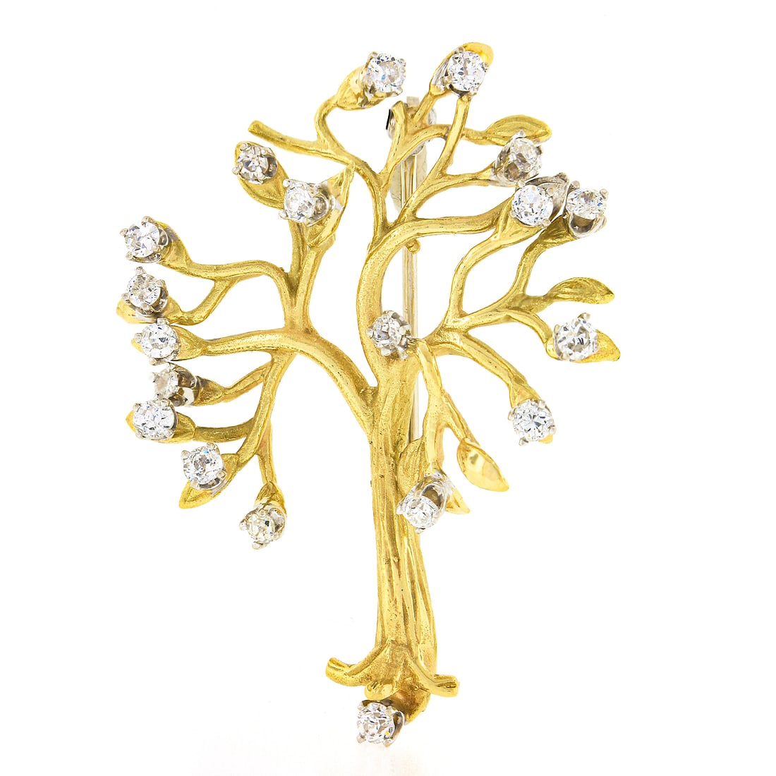 Textured 18K Two Tone Gold 1.0ctw Diamond Tree Branch Brooch: Textured 18K Two Tone Gold 1.0ctw Diamond Tree Branch Brooch This exquisite brooch showcases a textured tree branch design, elegantly crafted in solid 18K yellow gold with 14K white gold prong setting