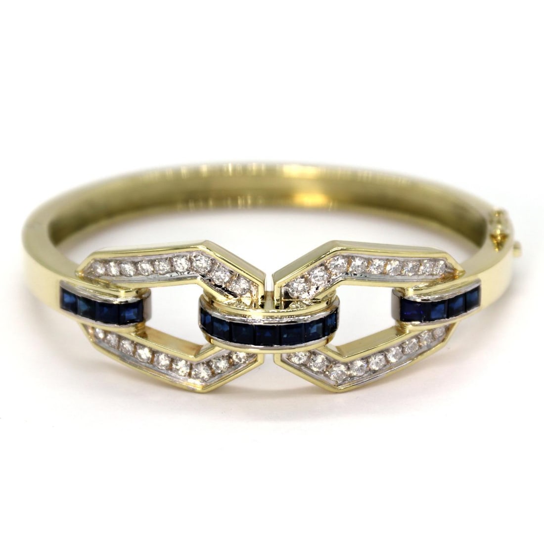 Stunning 18k Yellow Gold Diamond Sapphire Hinged Bracelet 4.50ct: Stunning 18k Yellow Gold Diamond Sapphire Hinged Bracelet 4.50ct This stunning hinged bracelet is crafted from 18k yellow gold with a polished finish, featuring a unique open double odd shape ring des