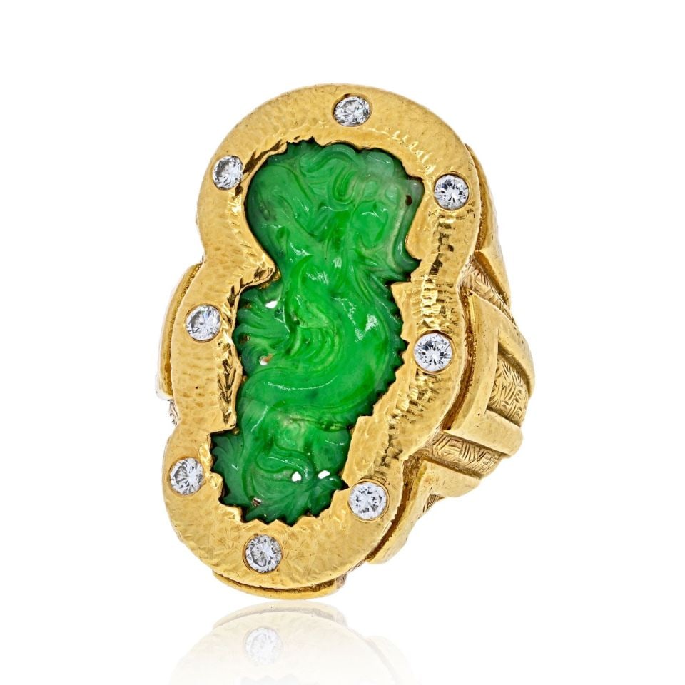 David Webb 1970s Carved Jade Dragon Ring Platinum 18K Gold: David Webb 1970s Carved Jade Dragon Ring Platinum 18K Gold This exquisite estate ring, designed by renowned American jeweler David Webb, showcases a stunning carved green jade plaque in the form of a 