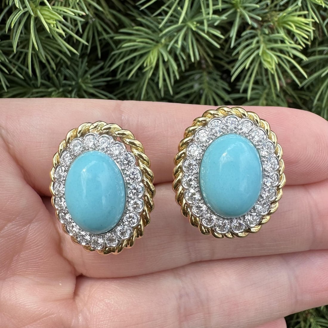 Charles Turi turquoise diamond halo earrings 18k gold platinum: Charles Turi turquoise diamond halo earrings 18k gold platinum These vintage earrings by Charles Turi feature oval cabochon-cut natural turquoise stones in a striking robin's egg blue, surrounded by a