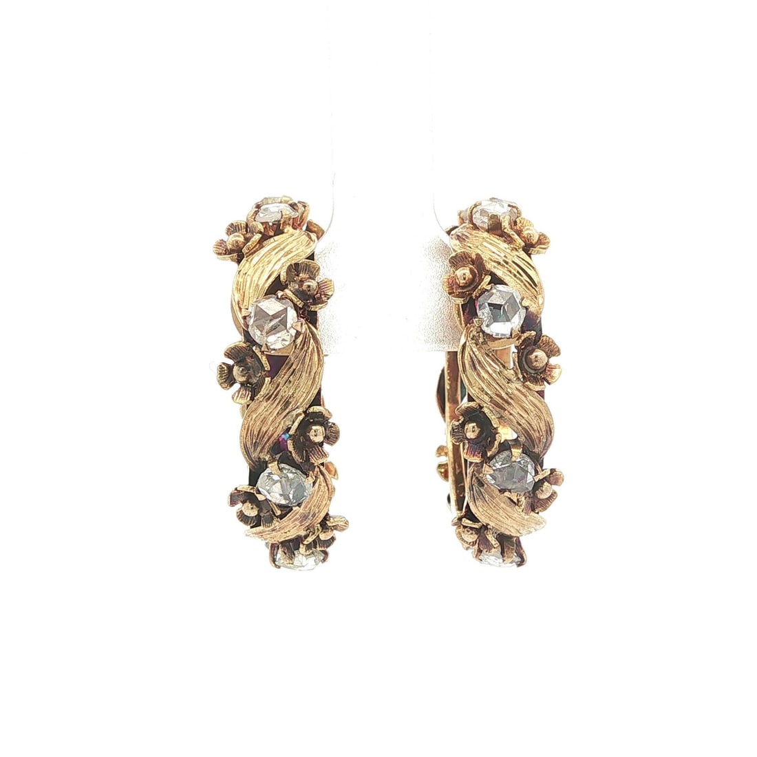 14k Yellow Gold Leaf Wreath Hoop Earrings with Rose Cut Diamonds: 14k Yellow Gold Leaf Wreath Hoop Earrings with Rose Cut Diamonds These vintage hoop earrings are crafted from solid 14k yellow gold and feature a unique flower and leaf wreath design. Each earring is 