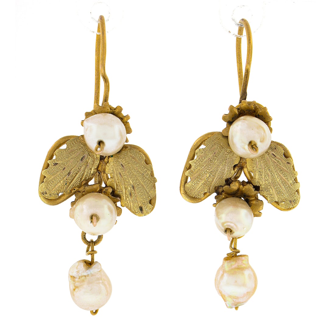 Vintage Retro 14K Gold Leaf Dangle Earrings with Baroque Pearls: Vintage Retro 14K Gold Leaf Dangle Earrings with Baroque Pearls Elevate your accessory collection with these stunning vintage retro earrings, crafted from solid 14K yellow and green gold. The earrings