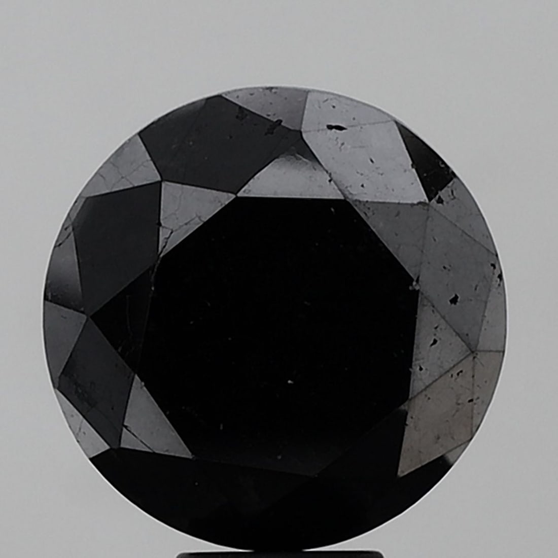 Loose Diamond - ROUND 11.04ct Black VS2: Loose Diamond - ROUND 11.04ct Black VS2 Source: Natural Shape: ROUND Carats: 11.04 Color: Black Certification: NONE Video: