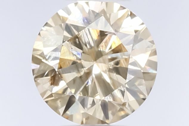 Loose Diamond - ROUND 0.51ct Fancy Yellow Brown: Loose Diamond - ROUND 0.51ct Fancy Yellow Brown Source: Natural Shape: ROUND Carats: 0.51 Color: Fancy Yellow Brown Certification: GIA Video: