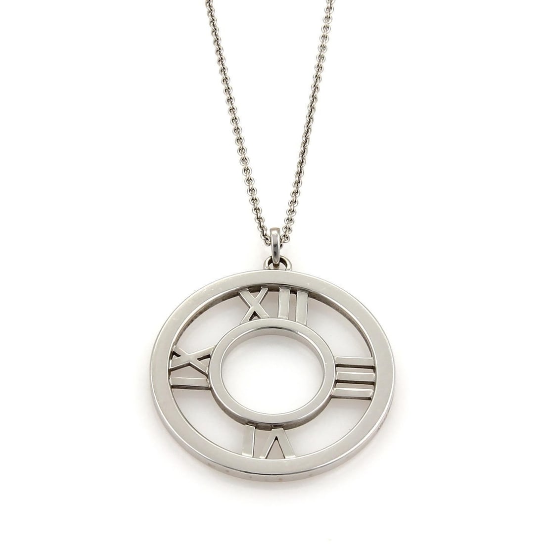 Tiffany & Co. Atlas 18k White Gold Roman Numeral Pendant Necklace: Tiffany & Co. Atlas 18k White Gold Roman Numeral Pendant Necklace This exquisite pendant necklace from Tiffany & Co. features a stunning design from the ATLAS collection. Crafted from authentic 18k wh