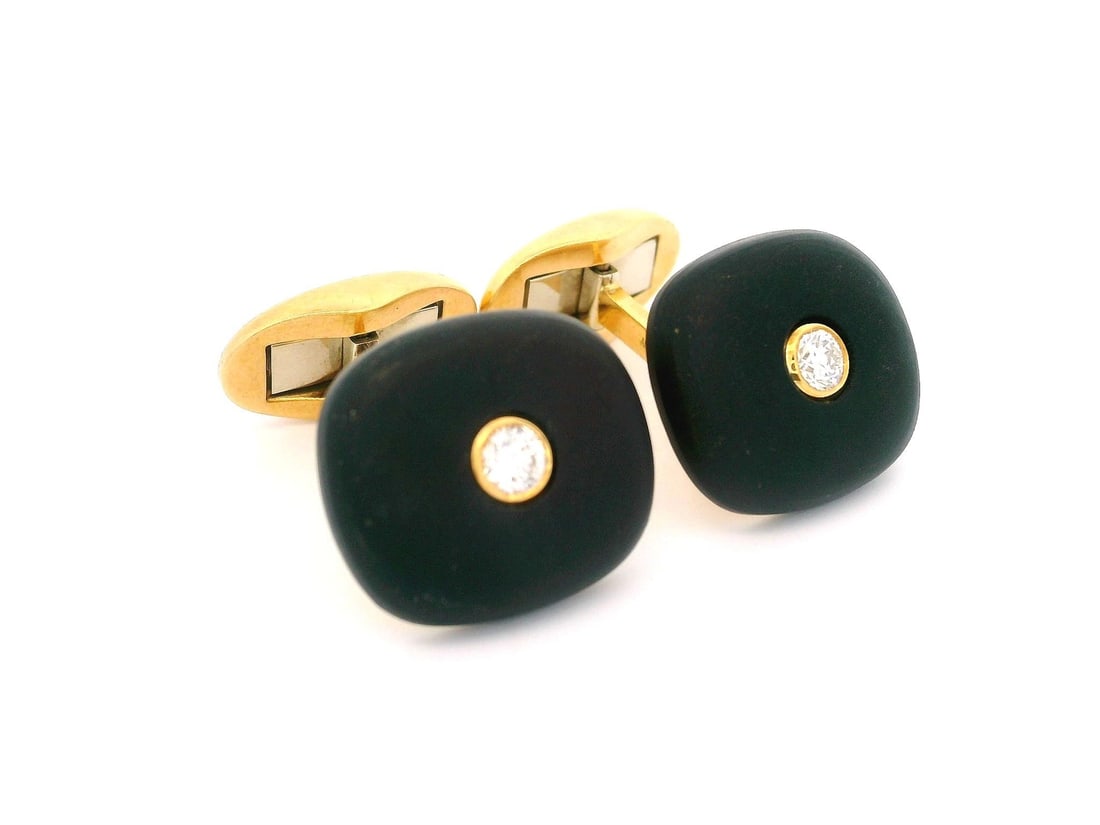 18k Gold Diamond Cushion Cufflinks with Matte Black Stone: 18k Gold Diamond Cushion Cufflinks with Matte Black Stone Elevate your style with these exquisite cufflinks featuring a sophisticated matte black hard stone design complemented by sparkling diamonds. 