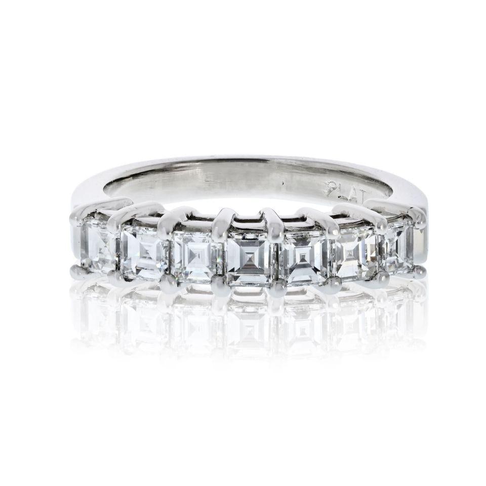 Platinum Wedding Band with 1.75ct Emerald Cut Diamonds: Platinum Wedding Band with 1.75ct Emerald Cut Diamonds This exquisite wedding band features a total of seven square emerald-cut diamonds, weighing approximately 1.75 carats. Crafted from high-quality 