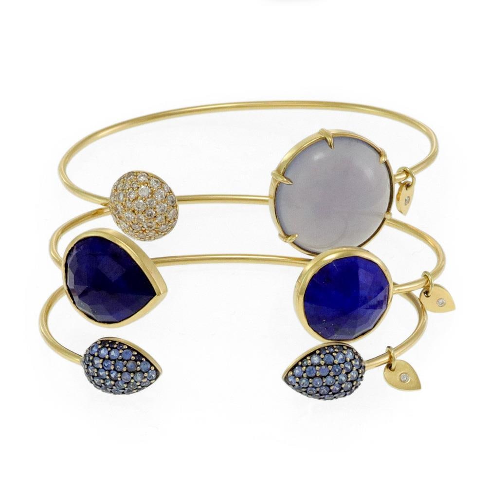 JW Designer 18k Yellow Gold Set of 3 Cuff Bracelets with Diamonds and Gemstones: JW Designer 18k Yellow Gold Set of 3 Cuff Bracelets with Diamonds and Gemstones Elevate your accessory collection with this chic set of 3 cuff bracelets, expertly crafted from 18k yellow gold. Each pi