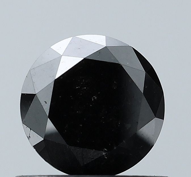 Loose Diamond - ROUND 0.86ct Black VS1: Loose Diamond - ROUND 0.86ct Black VS1 Source: Natural Shape: ROUND Carats: 0.86 Color: Black Certification: NONE Video: Video Link The Diamond Depot Guarantee: All items in this auction are
