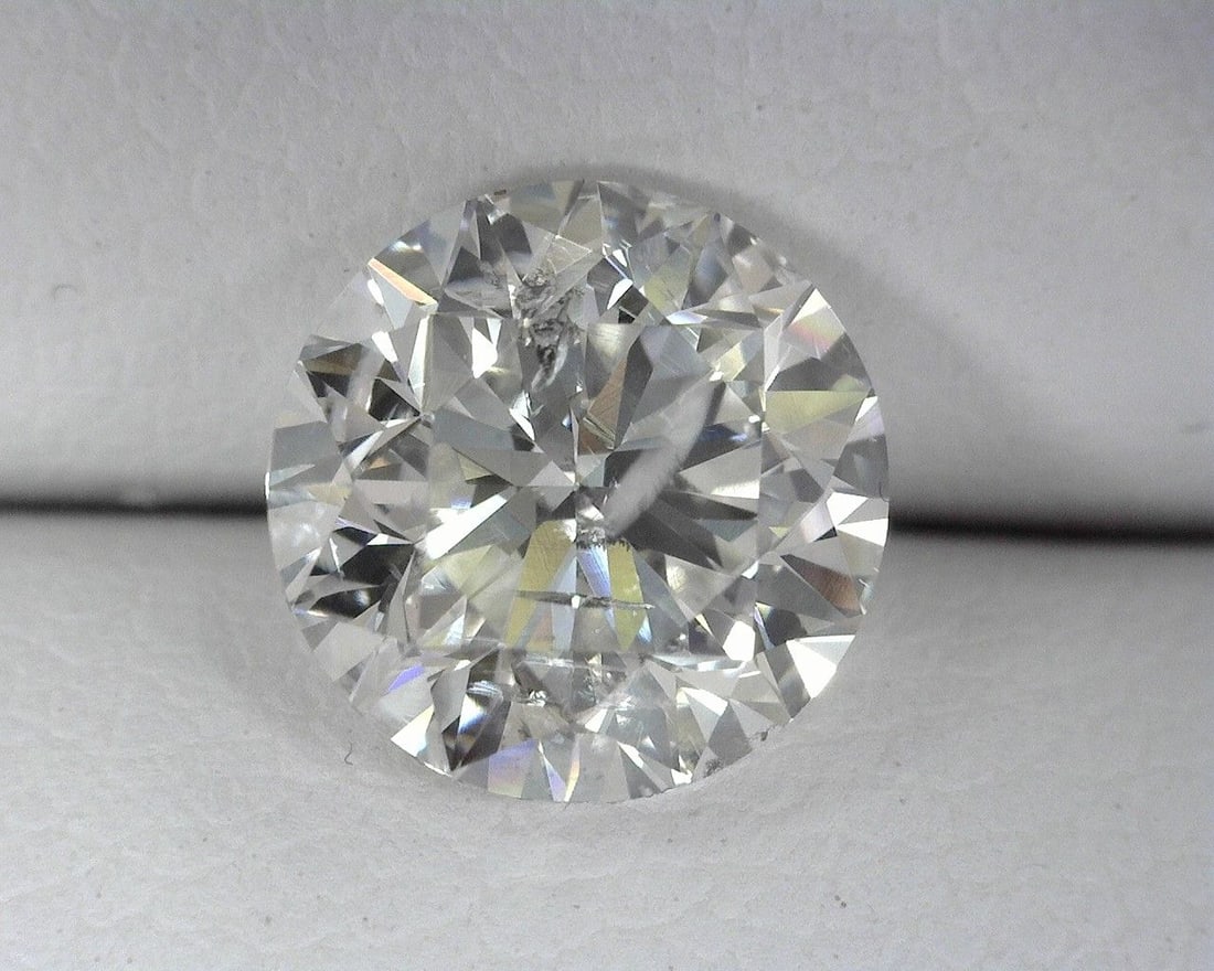 Loose Diamond - ROUND 1.43ct G I1: Loose Diamond - ROUND 1.43ct G I1 Source: Natural Shape: ROUND Carats: 1.43 Color: G Clarity: I1 Certification: OTHER The Diamond Depot Guarantee: All items in this auction are guaranteed to be 100% a