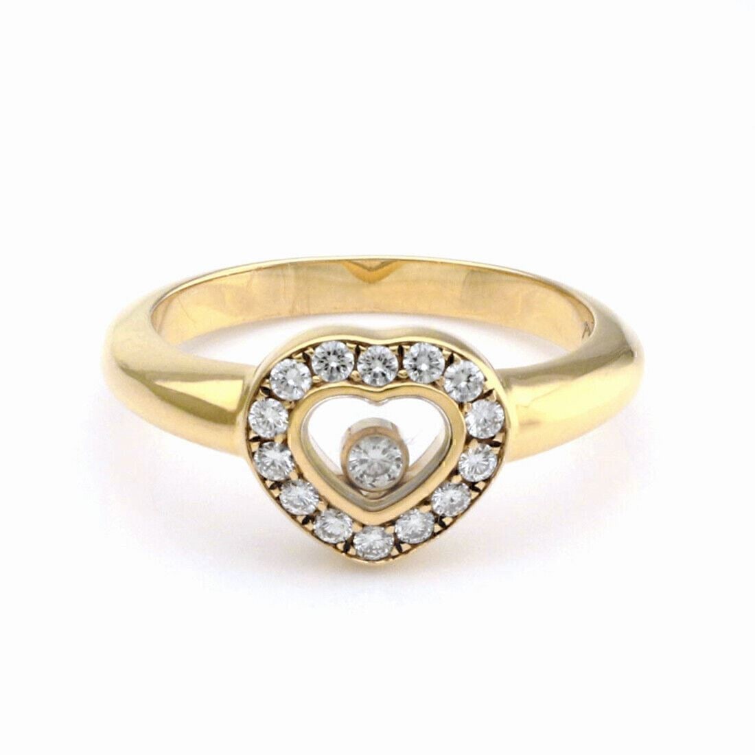 Chopard Happy Diamonds Heart Ring 18k Yellow Gold Size 5 with Certificate: Chopard Happy Diamonds Heart Ring 18k Yellow Gold Size 5 with Certificate A pre-owned Chopard Happy Diamonds bezel heart ring crafted in 18k yellow gold with a bezel-set diamond totaling approximately