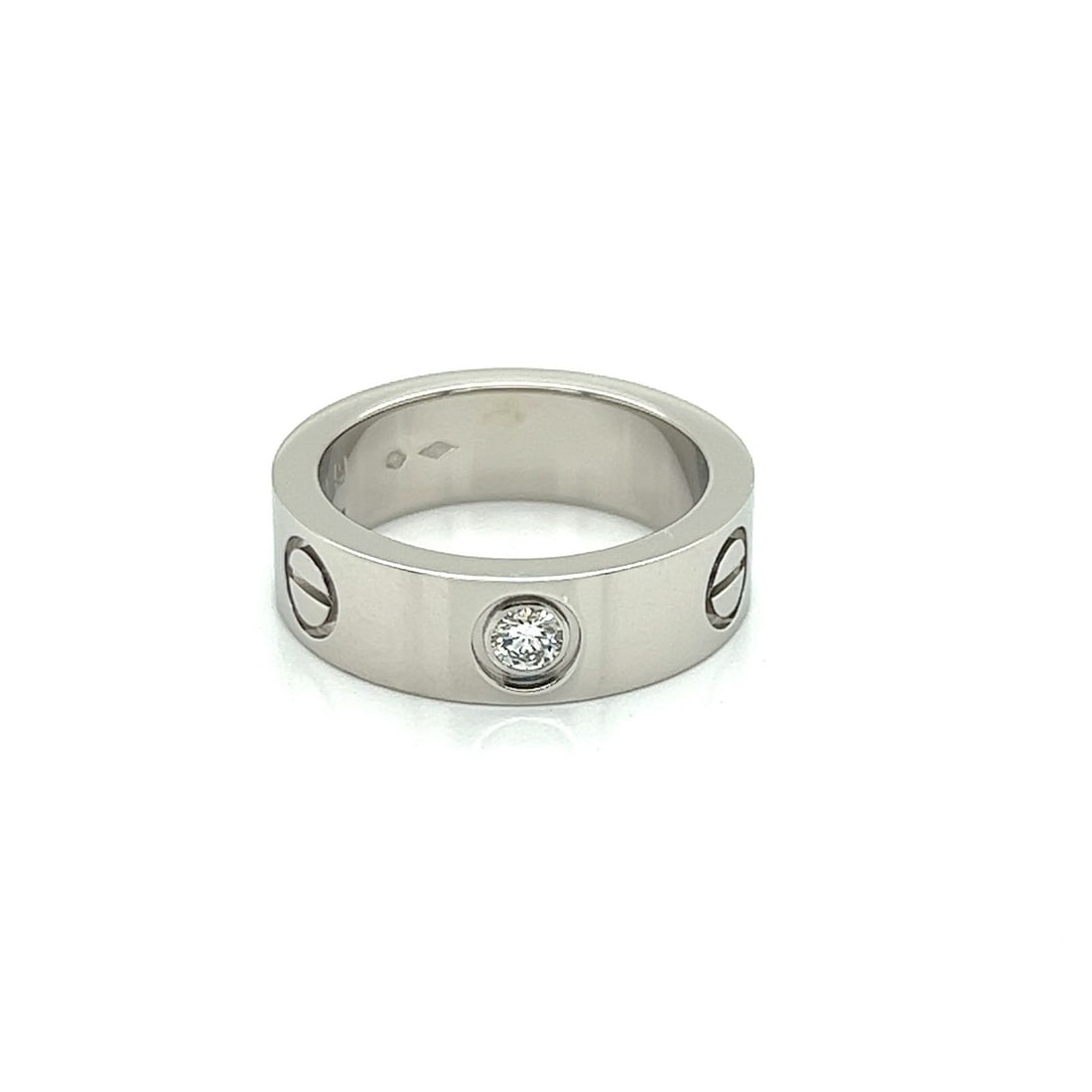 Cartier Love Platinum Diamond Band Ring Size 4.5 with Certificate: Cartier Love Platinum Diamond Band Ring Size 4.5 with Certificate Cartier LOVE band ring crafted in platinum with a diamond accent and the iconic screw motif design. It features a polished finish, sig