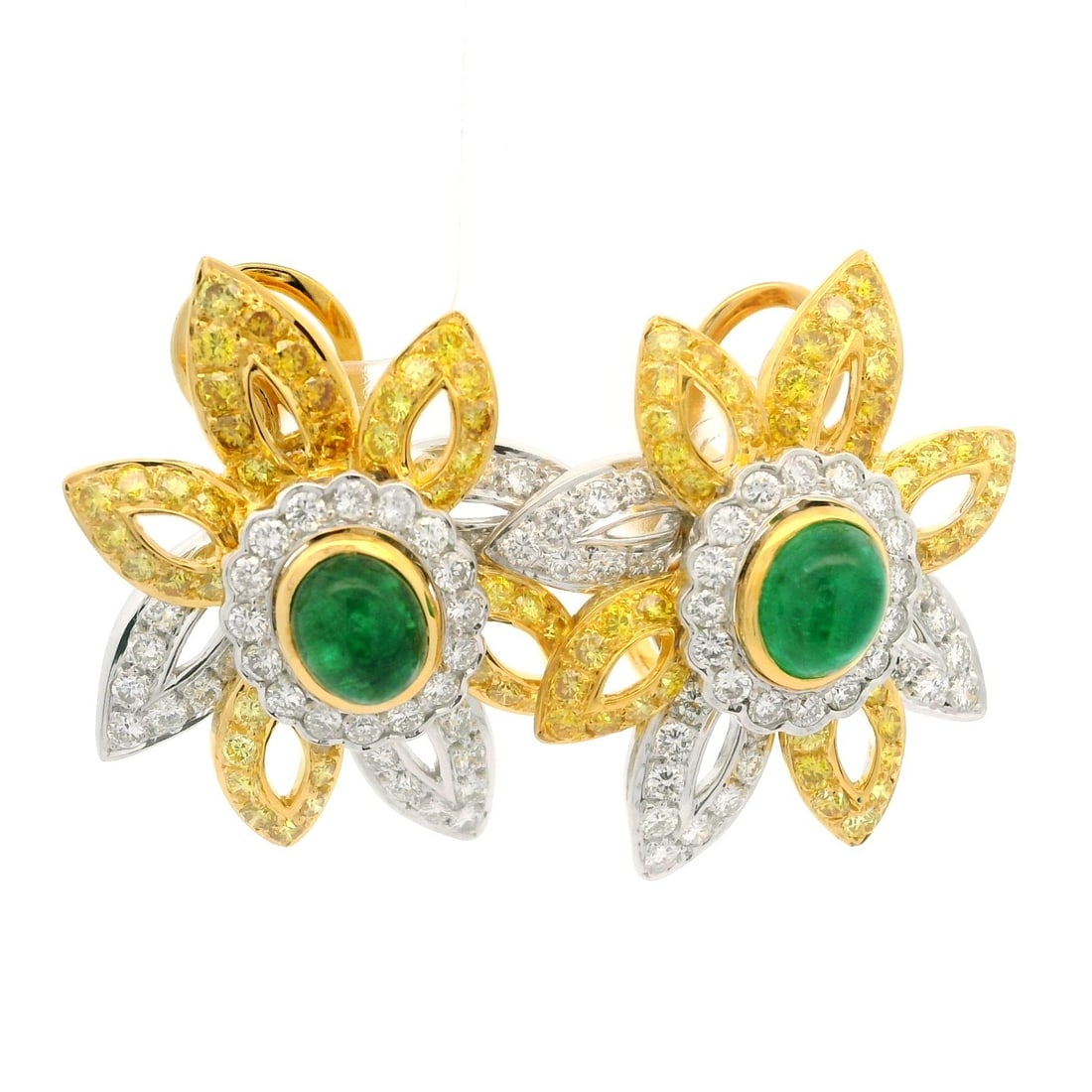 Omega GIA Certified 6.12ctw Emerald Fancy Diamond Flower Earrings: Omega GIA Certified 6.12ctw Emerald Fancy Diamond Flower Earrings Discover these stunning earrings, meticulously crafted with elegance in mind. Featuring two natural genuine emeralds, each an oval cab