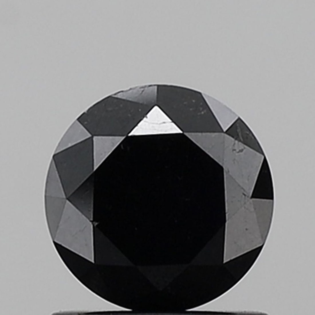 Loose Diamond - ROUND 1.16ct Fancy Black VVS2: Loose Diamond - ROUND 1.16ct Fancy Black VVS2 Source: Natural Shape: ROUND Carats: 1.16 Color: Fancy Black Certification: NONE Video: