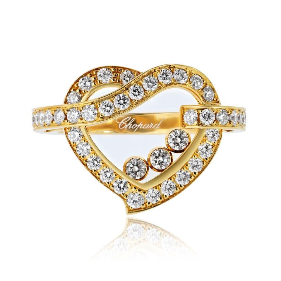 Chopard Happy Diamonds 18K Gold Estate Ring Size 6.5: Chopard Happy Diamonds 18K Gold Estate Ring Size 6.5 This pre-owned Chopard Happy Diamonds ring is crafted from 18K yellow gold and features a total diamond weight of 0.92 carats. The ring is a part o