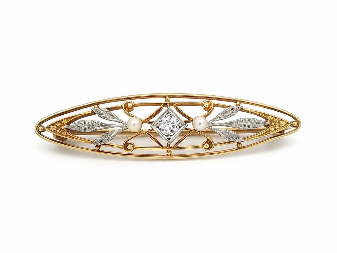 Krementz Art Nouveau marquise floral brooch 14k gold platinum pearl diamond: Krementz Art Nouveau marquise floral brooch 14k gold platinum pearl diamond Antique Art Nouveau brooch by Krementz & Co. featuring a detailed floral marquise design in solid 14k yellow gold with plati