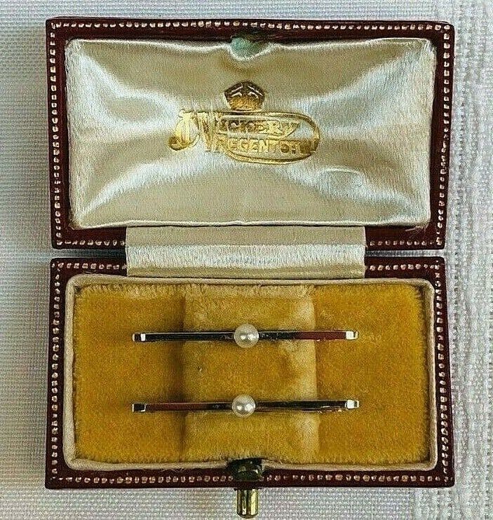 19th Century English 15K Gold Plated Pearl Brooches with Leather Box: 19th Century English 15K Gold Plated Pearl Brooches with Leather Box Discover a stunning pair of 19th century English brooches, expertly crafted from 15K yellow gold plating and adorned with beautiful