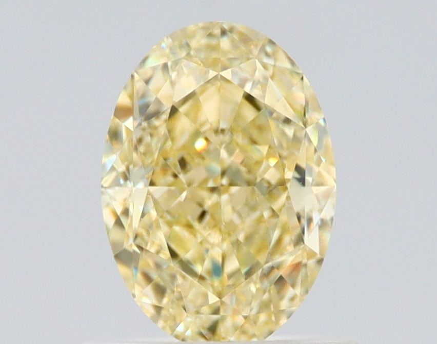 Loose Diamond - OVAL 1.0ct Fancy Yellow VS2: Loose Diamond - OVAL 1.0ct Fancy Yellow VS2 Source: Natural Shape: OVAL Carats: 1.0 Color: Fancy Yellow Certification: GIA Video: