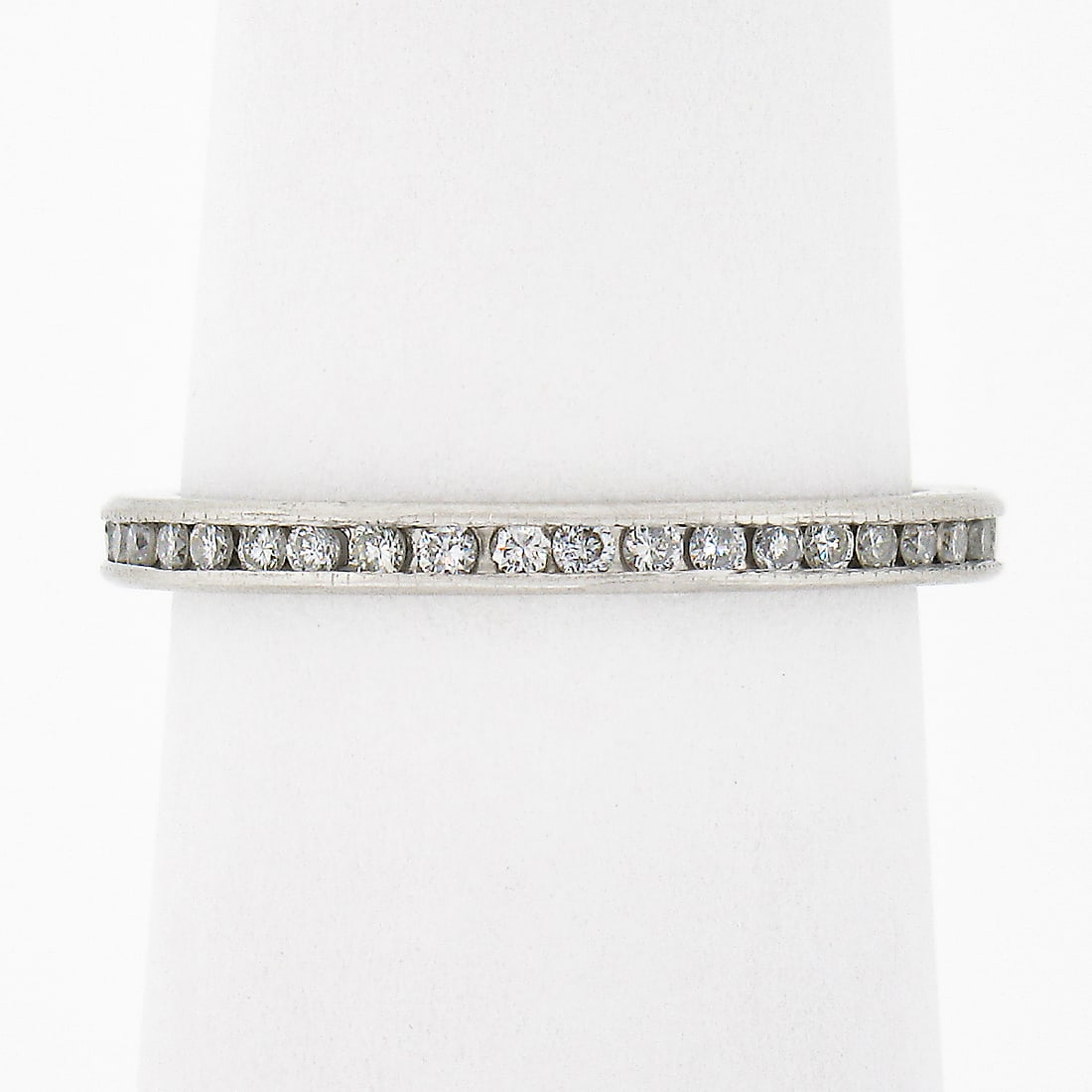 Platinum 0.80ct Diamond Eternity Band Ring Engraved Stackable 5.5: Platinum 0.80ct Diamond Eternity Band Ring Engraved Stackable 5.5 This vintage eternity band ring is crafted from solid .950 platinum and features 40 natural old transitional cut diamonds channel set 