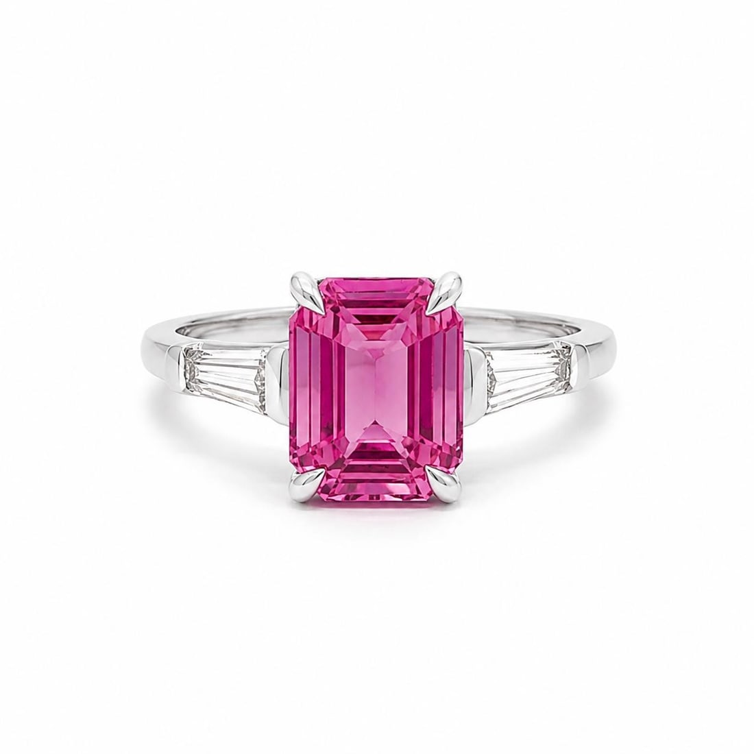 Platinum Cocktail Ring with 2.04ct GIA Pink Sapphire and Baguette Diamonds: Platinum Cocktail Ring with 2.04ct GIA Pink Sapphire and Baguette Diamonds Pre-owned women's cocktail ring featuring a natural vivid pink sapphire accented by two tapered baguette diamonds. The sapphi