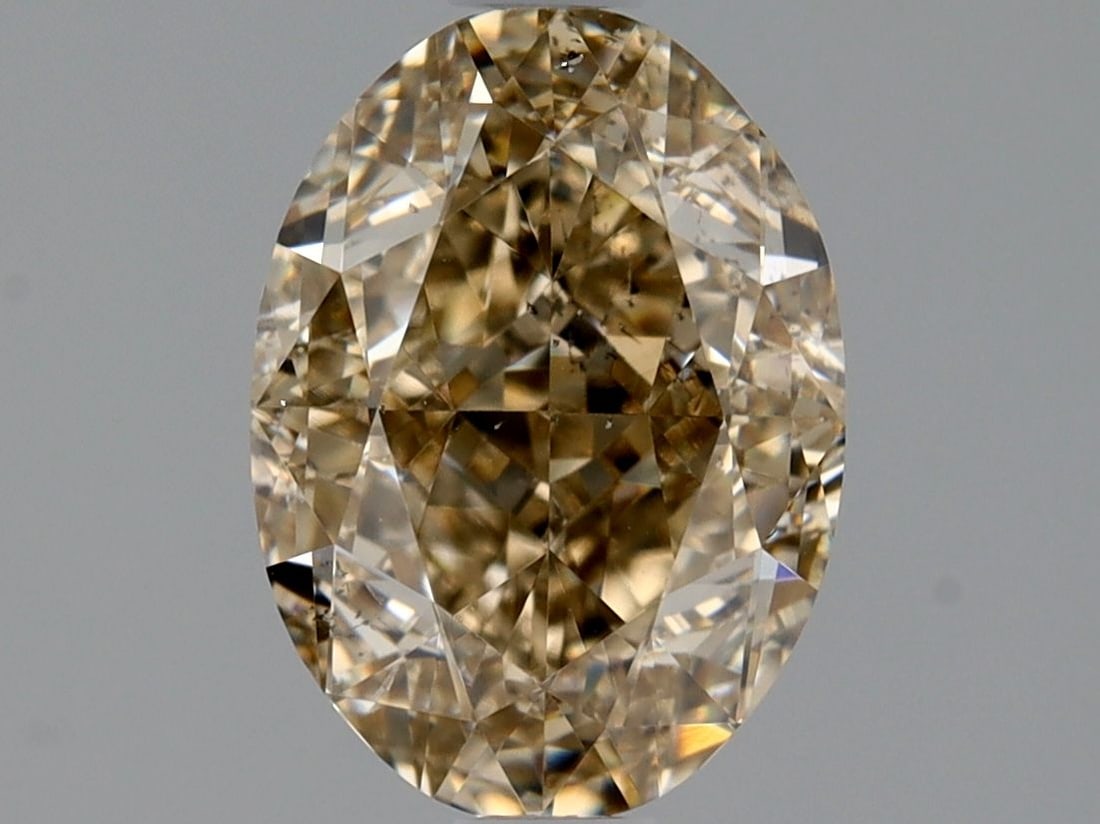 Loose Diamond - OVAL 1.5ct Fancy Light Yellow Brown SI2: Loose Diamond - OVAL 1.5ct Fancy Light Yellow Brown SI2 Source: Natural Shape: OVAL Carats: 1.5 Color: Fancy Light Yellow Brown Certification: GIA Video: