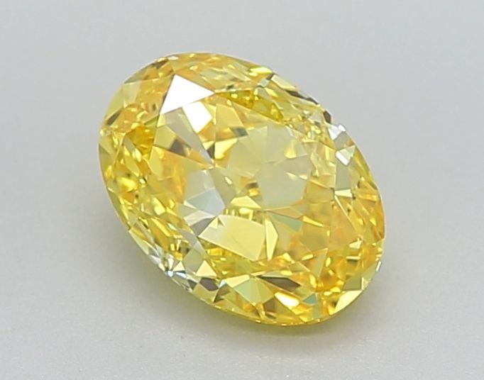 Loose Diamond - OVAL 1.28ct Fancy Vivid Yellow VVS1: Loose Diamond - OVAL 1.28ct Fancy Vivid Yellow VVS1 Source: This is a real non-mined Diamond that has been grown in a lab Shape: OVAL Carats: 1.28 Color: Fancy Vivid Yellow Certification: IGI Video: