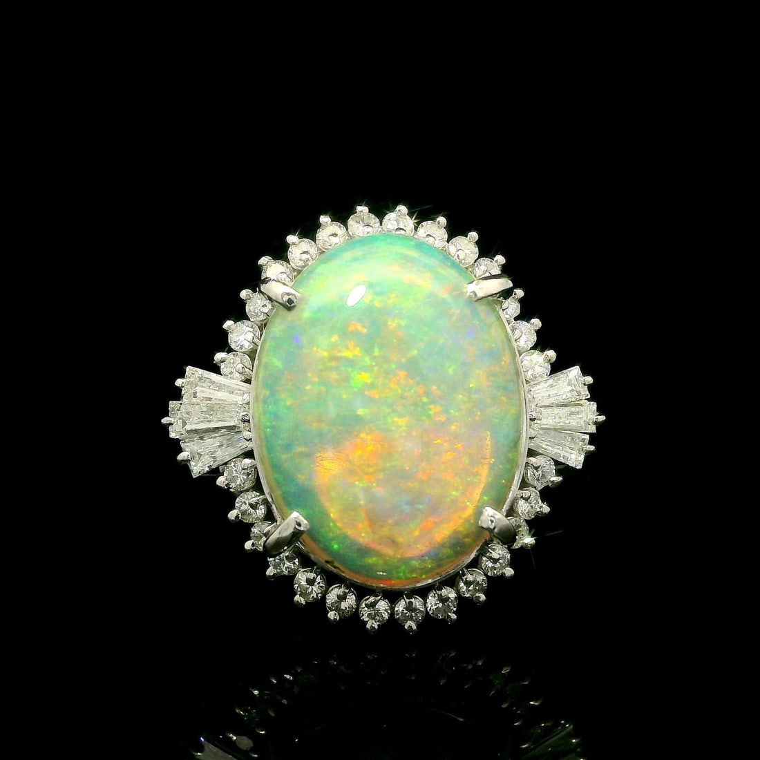 Vintage Platinum Opal 5.92ct Diamond Halo Cocktail Ring: Vintage Platinum Opal 5.92ct Diamond Halo Cocktail Ring This stunning vintage cocktail ring is crafted in solid .900 platinum and features a captivating 5.23ct natural opal at its center. The opal is