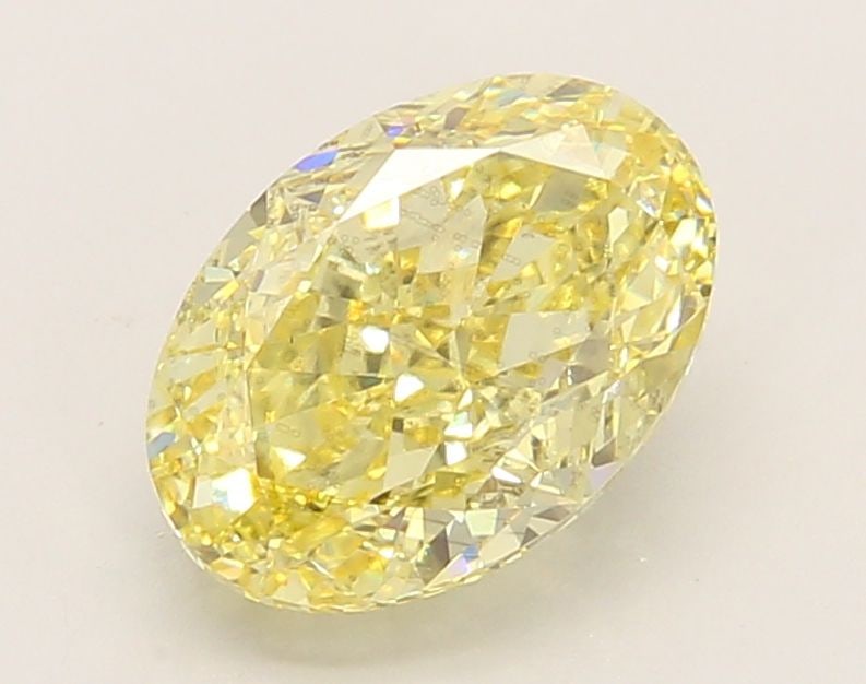 Loose Diamond - OVAL 2.18ct Fancy Vivid Yellow VS2: Loose Diamond - OVAL 2.18ct Fancy Vivid Yellow VS2 Source: This is a real non-mined Diamond that has been grown in a lab Shape: OVAL Carats: 2.18 Color: Fancy Vivid Yellow Certification: IGI Video: