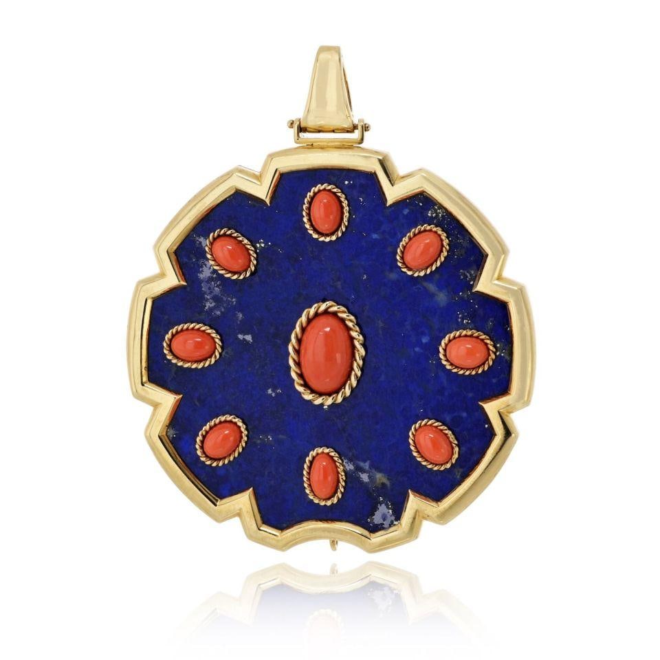 1970s Lapis Lazuli and Coral Pendant in 18K Yellow Gold by Van Cleef & Arpels: 1970s Lapis Lazuli and Coral Pendant in 18K Yellow Gold by Van Cleef & Arpels This Van Cleef & Arpels pendant from the 1970s is crafted in 18K yellow gold. The design features a deep blue lapis lazuli