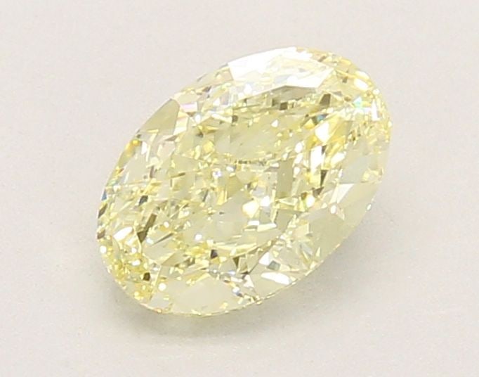 Loose Diamond - OVAL 1.02ct Fancy Light Yellow VVS2: Loose Diamond - OVAL 1.02ct Fancy Light Yellow VVS2 Source: This is a real non-mined Diamond that has been grown in a lab Shape: OVAL Carats: 1.02 Color: Fancy Light Yellow Certification: IGI Video:
