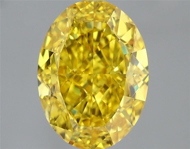 Loose Diamond - OVAL 2.01ct Fancy Vivid Yellow VVS2: Loose Diamond - OVAL 2.01ct Fancy Vivid Yellow VVS2 Source: This is a real non-mined Diamond that has been grown in a lab Shape: OVAL Carats: 2.01 Color: Fancy Vivid Yellow Certification: IGI Video: