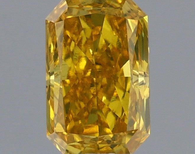Loose Diamond - RADIANT 0.76ct Fancy Vivid Yellow VS1: Loose Diamond - RADIANT 0.76ct Fancy Vivid Yellow VS1 Source: This is a real non-mined Diamond that has been grown in a lab Shape: RADIANT Carats: 0.76 Color: Fancy Vivid Yellow Certification: IGI Vid