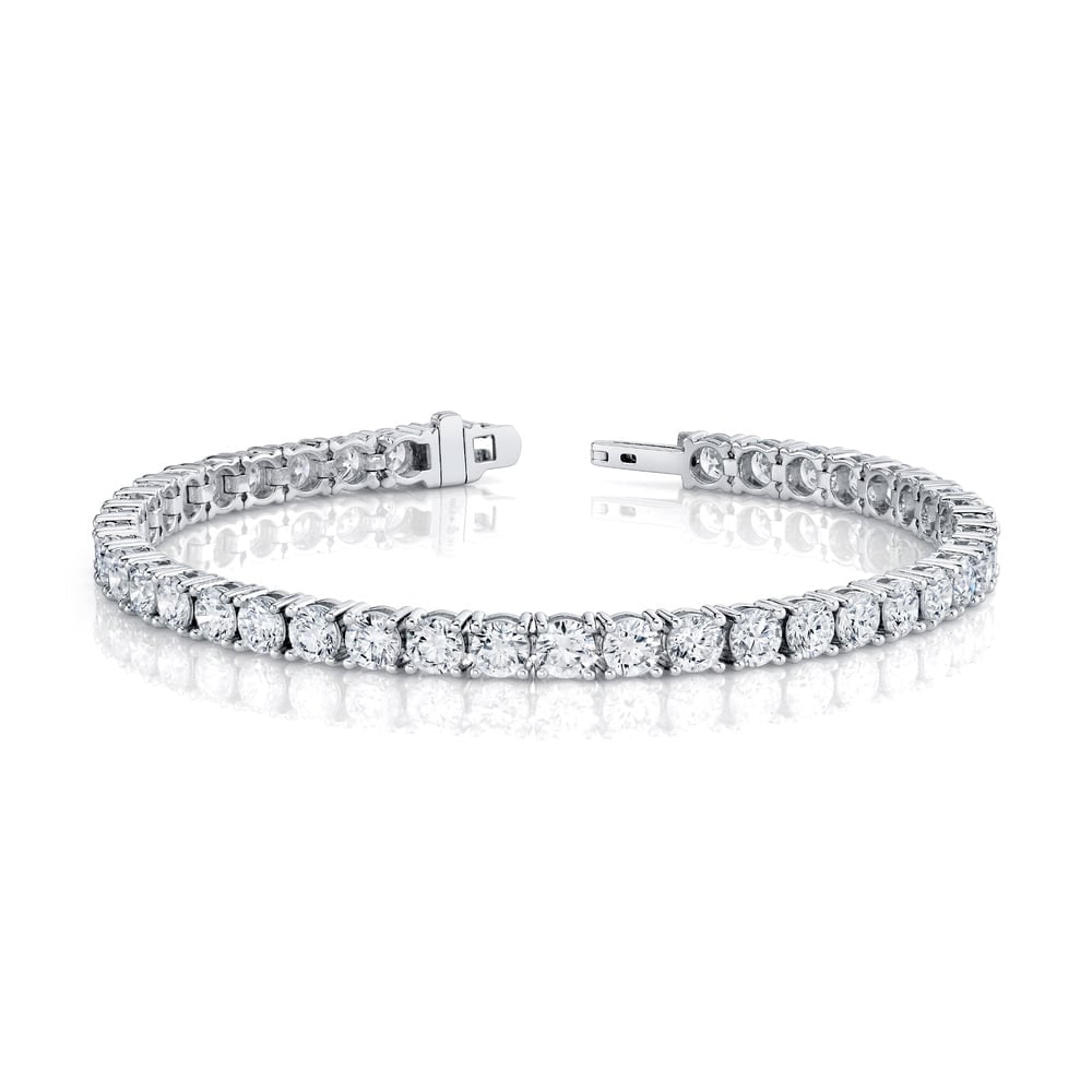 14K White Gold Lab Grown Diamond 28Ct.Tw. Tennis Bracelet (7 Inches): 14K White Gold Lab Grown Diamond 28Ct.Tw. Tennis Bracelet (7 Inches) This 14K White Gold 7-inch tennis bracelet showcases lab grown diamonds totaling 28 Ct.Tw., delivering show-stopping brilliance. 14