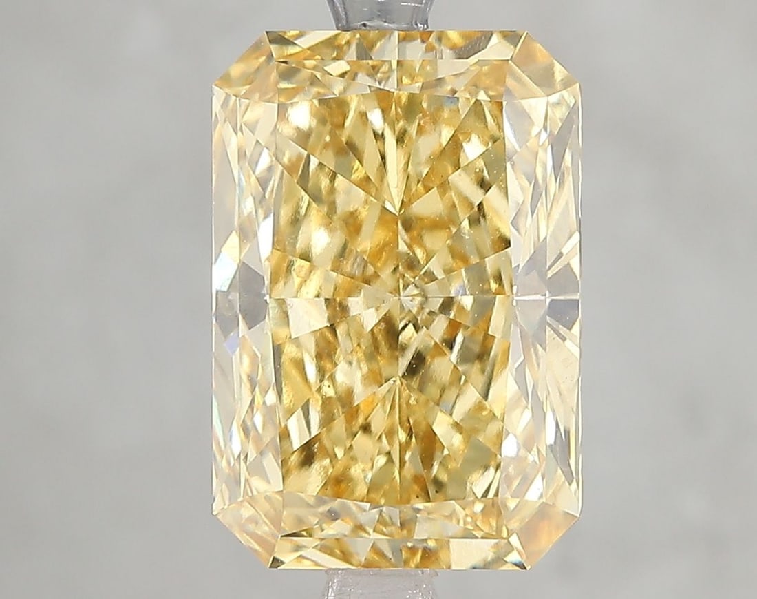 Loose Diamond - RADIANT 5.08ct Fancy Vivid Yellow VS2: Loose Diamond - RADIANT 5.08ct Fancy Vivid Yellow VS2 Source: This is a real non-mined Diamond that has been grown in a lab Shape: RADIANT Carats: 5.08 Color: Fancy Vivid Yellow Certification: IGI Vid
