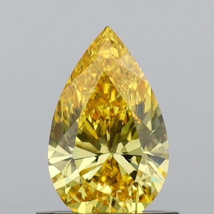 Loose Diamond - PEAR 0.78ct Fancy Vivid Yellow VVS2: Loose Diamond - PEAR 0.78ct Fancy Vivid Yellow VVS2 Source: This is a real non-mined Diamond that has been grown in a lab Shape: PEAR Carats: 0.78 Color: Fancy Vivid Yellow Certification: IGI Video:
