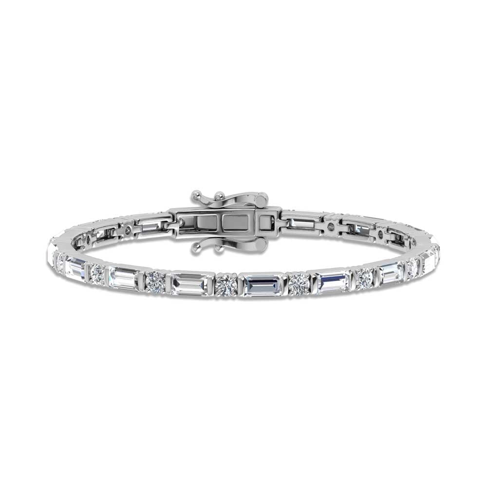 14K White Gold Round & Baguette Lab Grown Diamond 7 Ct.Tw. Tennis Bracelet: 14K White Gold Round & Baguette Lab Grown Diamond 7 Ct.Tw. Tennis Bracelet Crafted in 14K White Gold, this tennis bracelet dazzles with lab grown diamonds totaling 7 Ct.Tw., radiating sophisticated