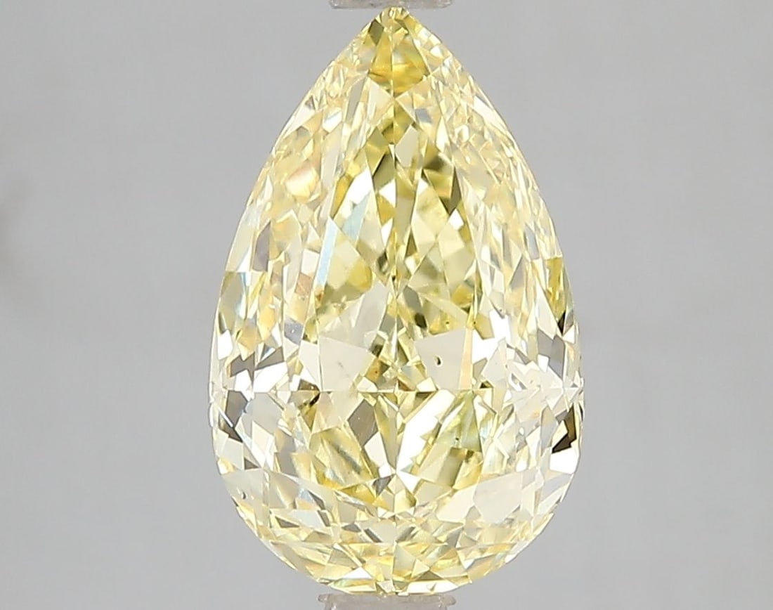 Loose Diamond - PEAR 3.02ct Fancy Vivid Yellow VS2: Loose Diamond - PEAR 3.02ct Fancy Vivid Yellow VS2 Source: This is a real non-mined Diamond that has been grown in a lab Shape: PEAR Carats: 3.02 Color: Fancy Vivid Yellow Certification: IGI Video: