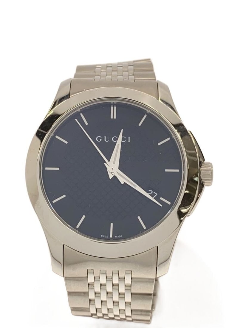 Gucci G Timeless Quartz Black Mens Wristwatch Box Links Included: Gucci G Timeless Quartz Black Mens Wristwatch Box Links Included This is a pre-owned Gucci G-Timeless Quartz 126.4 men's wristwatch, crafted in Switzerland. The watch features a black color scheme and