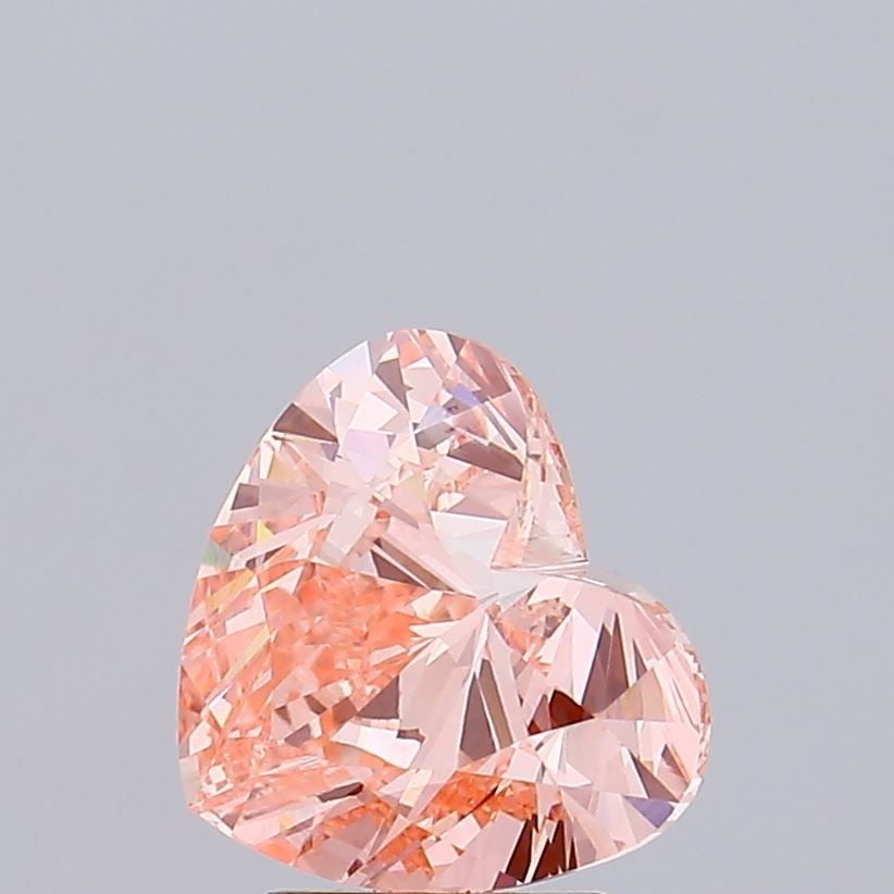 Loose Diamond - HEART 3.0ct Fancy Vivid Pink VS2: Loose Diamond - HEART 3.0ct Fancy Vivid Pink VS2 Source: This is a real non-mined Diamond that has been grown in a lab Shape: HEART Carats: 3.0 Color: Fancy Vivid Pink Certification: IGI Video: