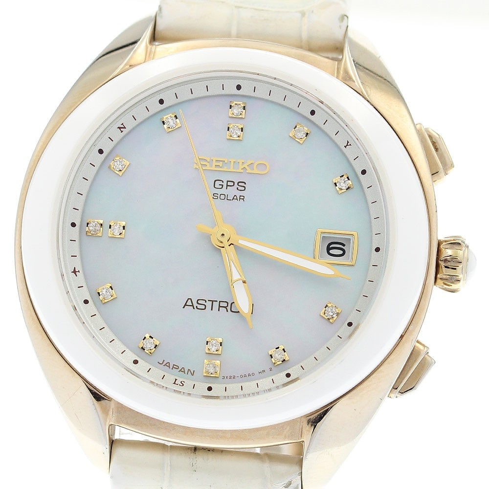 Seiko Astron Women's Solar Radio-Controlled Wristwatch: Seiko Astron Women's Solar Radio-Controlled Wristwatch This Seiko Astron women's wristwatch, model STXD002/3X22-0AA0, features a ceramic and gold-plated case paired with a leather bracelet. The watch 
