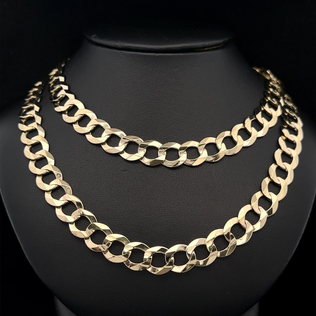 26.5 Inch 10k Yellow Gold Wide Curb Link Chain Necklace for Men: 26.5 Inch 10k Yellow Gold Wide Curb Link Chain Necklace for Men This men's necklace features a wide curb Cuban link design crafted in solid 10k yellow gold. The chain has a polished finish and measure