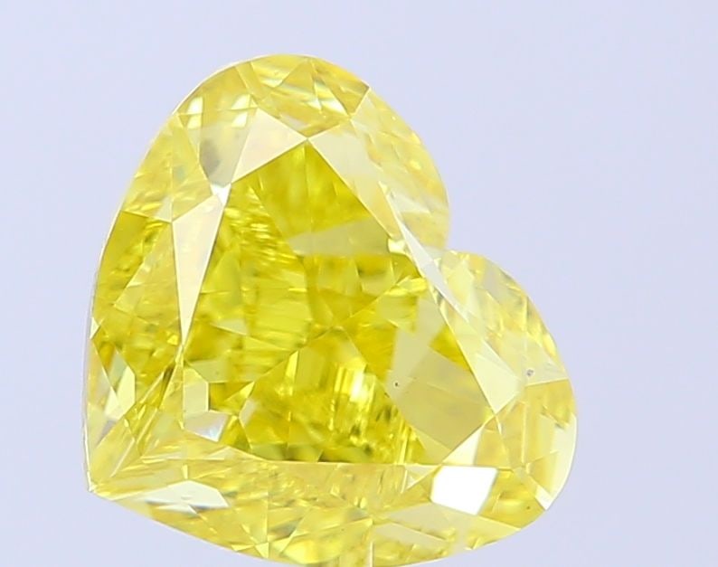 Loose Diamond - HEART 4.52ct Fancy Intense Yellow VVS2: Loose Diamond - HEART 4.52ct Fancy Intense Yellow VVS2 Source: This is a real non-mined Diamond that has been grown in a lab Shape: HEART Carats: 4.52 Color: Fancy Intense Yellow Certification: IGI Vi