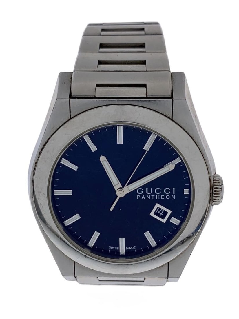 Gucci Pantheon Swiss Men's Wristwatch 115.2: Gucci Pantheon Swiss Men's Wristwatch 115.2 This is a pre-owned men's Gucci Pantheon 115.2 wristwatch, made in Switzerland. The watch features a classic design with noticeable scratches throughout, re