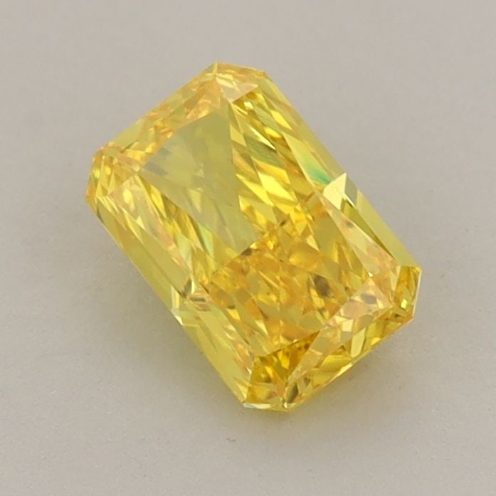 Loose Diamond - RADIANT 0.78ct Fancy Vivid Yellow VVS2: Loose Diamond - RADIANT 0.78ct Fancy Vivid Yellow VVS2 Source: This is a real non-mined Diamond that has been grown in a lab Shape: RADIANT Carats: 0.78 Color: Fancy Vivid Yellow Certification: IGI Vi