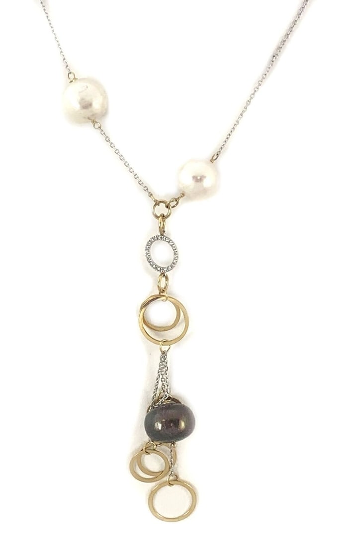 Collana C. Perle 18k Two Tone Gold Pearl Diamond Dangle Necklace: Collana C. Perle 18k Two Tone Gold Pearl Diamond Dangle Necklace This fine necklace features an elongated fancy dangle pendant design in 18k white and yellow gold, accented with approximately 0.05 ct 