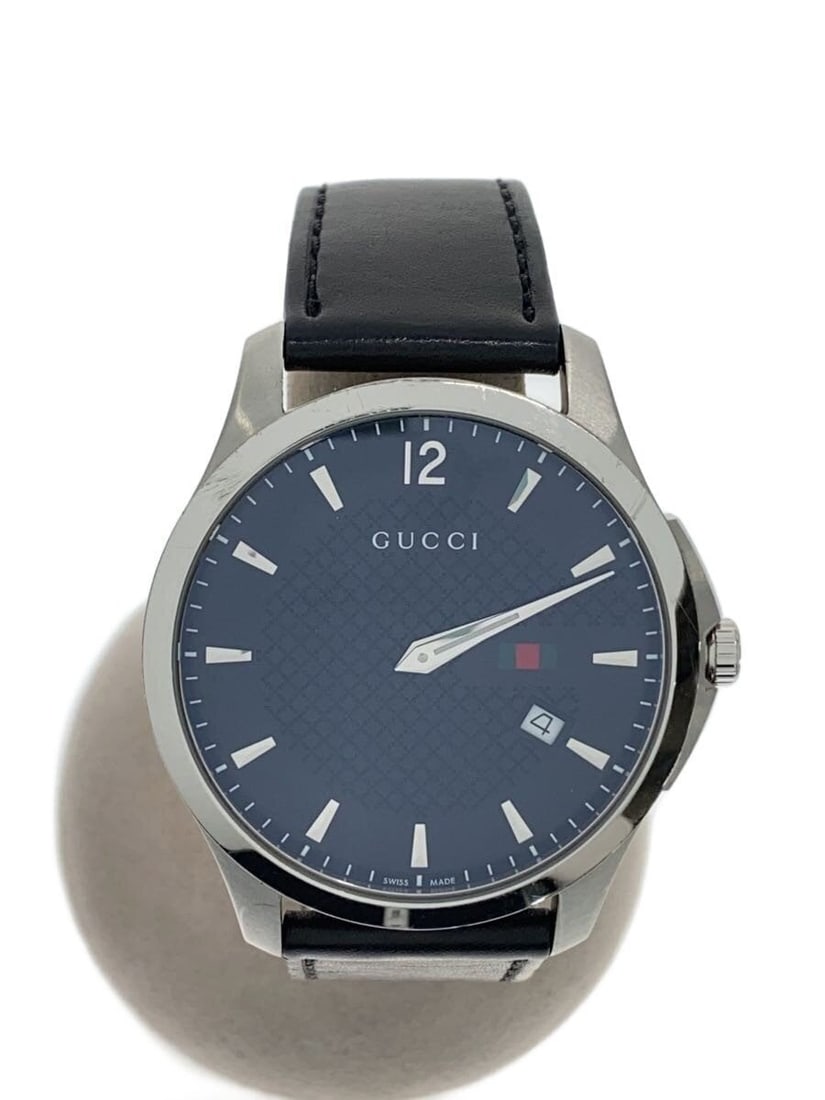 Gucci G Timeless quartz leather strap wristwatch for men: Gucci G Timeless quartz leather strap wristwatch for men This GUCCI G-TIMELESS Quartz 126.3 men's wristwatch features a black leather strap and a classic design. Made in Switzerland, it is designed fo