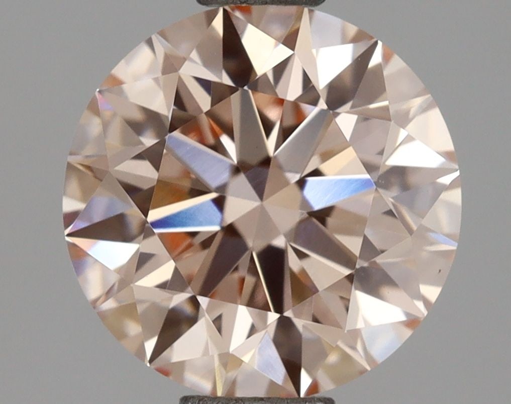 Ideal Loose Diamond - ROUND 1.85ct Fancy Pink VS1: Ideal Loose Diamond - ROUND 1.85ct Fancy Pink VS1 Source: This is a real non-mined Diamond that has been grown in a lab Shape: ROUND Carats: 1.85 Color: Fancy Pink Certification: IGI Video: Video
