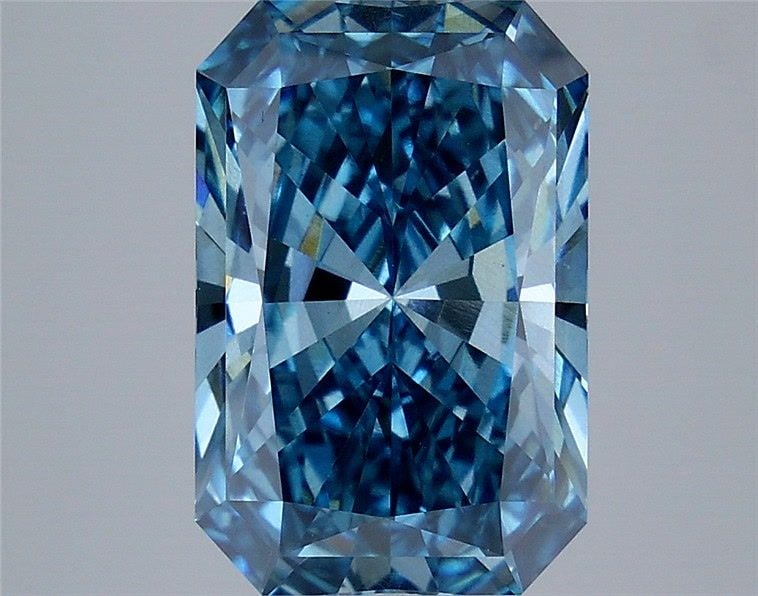 Loose Diamond - RADIANT 5.71ct Fancy Vivid Blue VS2: Loose Diamond - RADIANT 5.71ct Fancy Vivid Blue VS2 Source: This is a real non-mined Diamond that has been grown in a lab Shape: RADIANT Carats: 5.71 Color: Fancy Vivid Blue Certification: IGI Video: